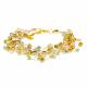 9 STRAND BRACELET ON SILK PERIDOT