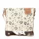 CREAM SHOULDER BAG WITH COWHIDE TRIM AND FLOWERS