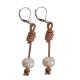 SINGLE PEARL EARRING ON LEATHER 2